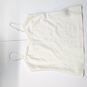 White slip top - like satin material. Medium